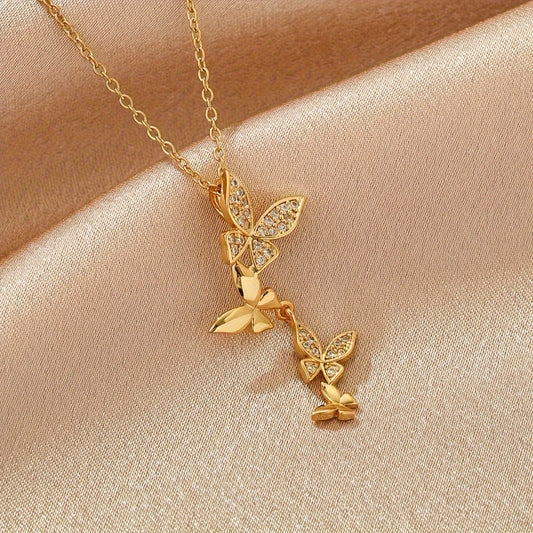 A golden stainless steel gold-plated cubic zirconia butterfly design necklace with an elegant and minimalist design. It is fashionable, minimalist, and trendy for women to wear on the streets, daily commuting, holidays, parties, and gatherings